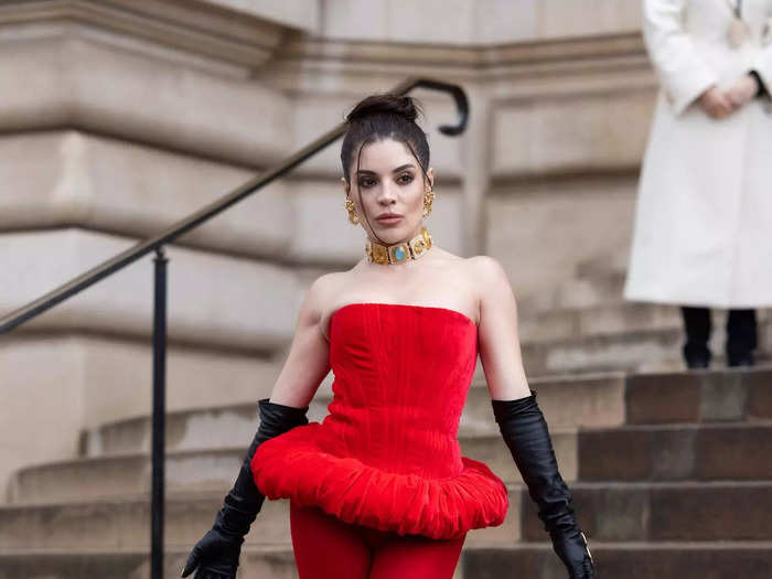 Brazilian actor Gkay embraced the balletcore trend in a bold red look. 