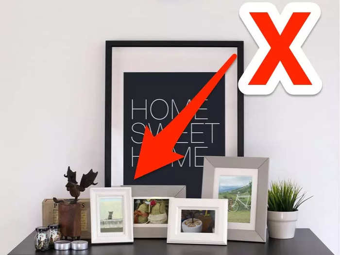 Placing too many picture frames on surfaces will create clutter.