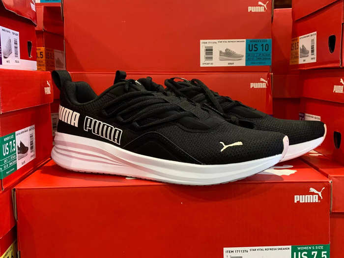 I visit Costco to purchase my next pair of running shoes.