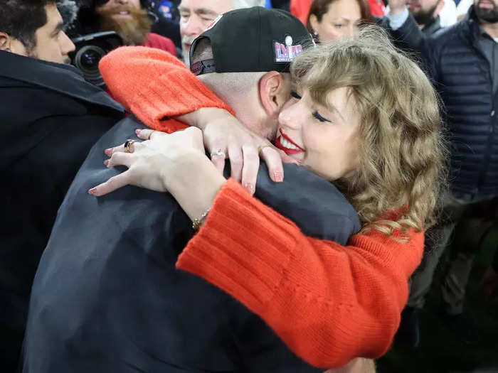 Swift rushed onto the field to embrace Kelce following the Chiefs