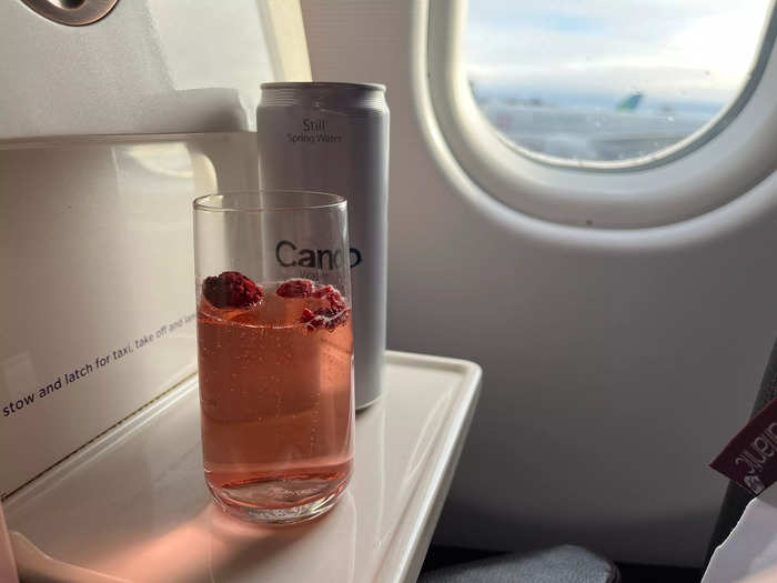 Once on board, I was greeted with a can of water and a cocktail.