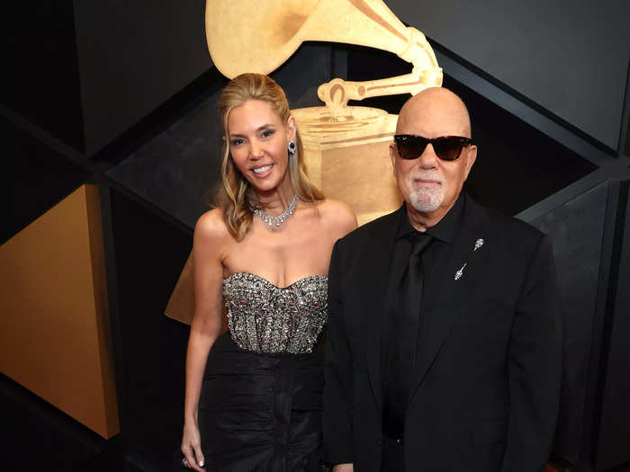 Billy Joel and Alexis Roderick matched each other with a black-and-silver theme.