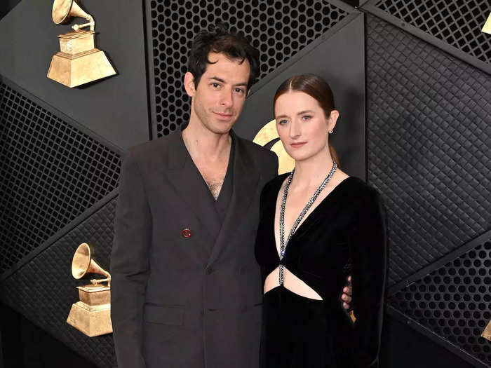 Mark Ronson wore a black suit with a low neckline. His wife, the actor Grace Gummer, was in a sleek black dress.