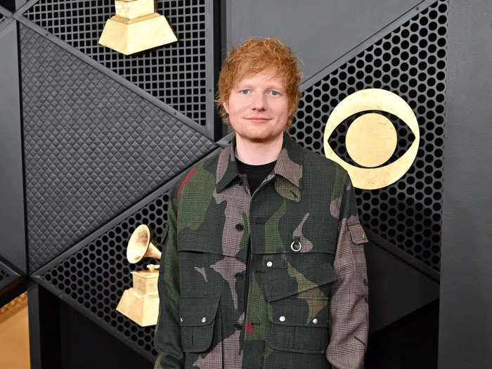 Ed Sheeran looked cool in camouflage on the red carpet but was let down by his footwear. 