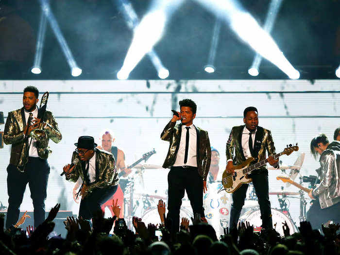 Bruno Mars and his musical group wore matching gold jackets to his 2014 Super Bowl halftime show.