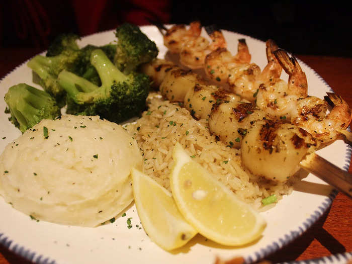 My friend ordered the grilled sea scallops and shrimp skewers.