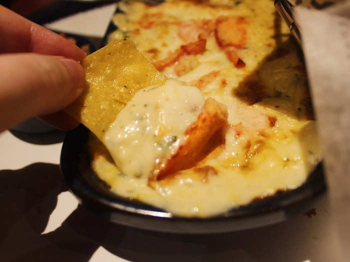 The dip was piping hot when it arrived and contained large pieces of lobster meat. 