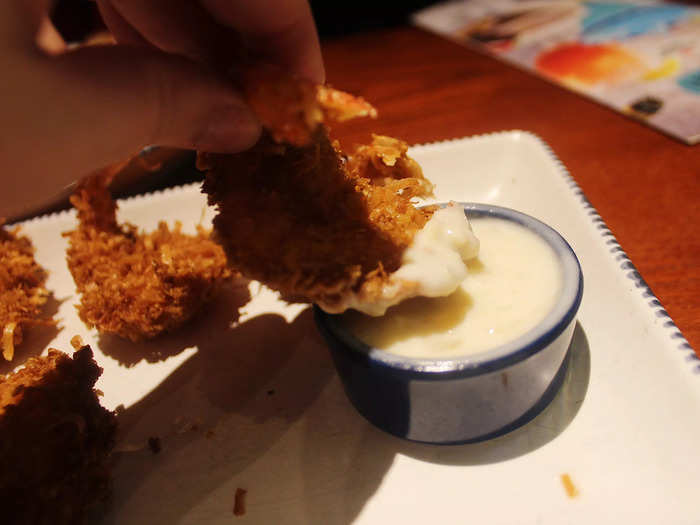 The shrimp were extremely crispy, and the sweet coconut flaked off in my mouth with every bite.