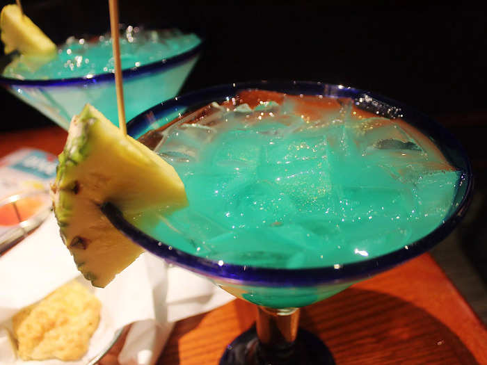 The margaritas were very large. They came topped with a pineapple garnish and a paper, glitter-covered lobster.