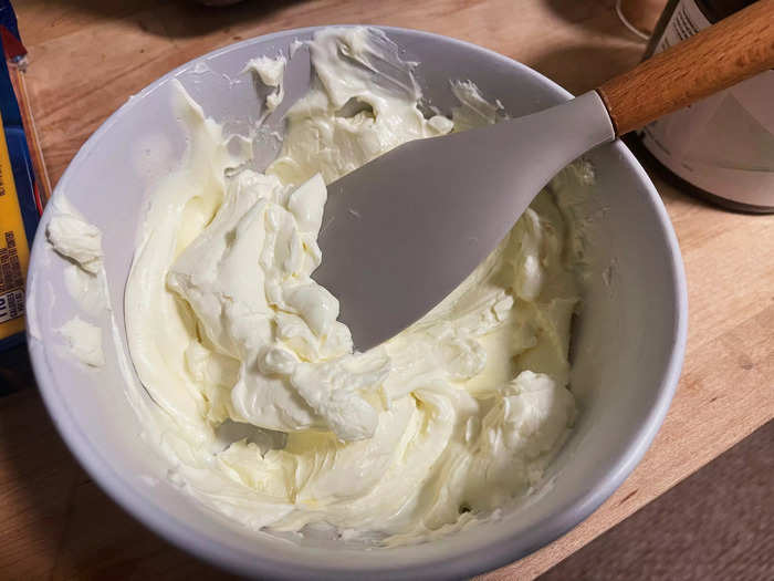 After preheating my oven to 375-degrees Fahrenheit, I started by softening the cream cheese in a medium-sized bowl.