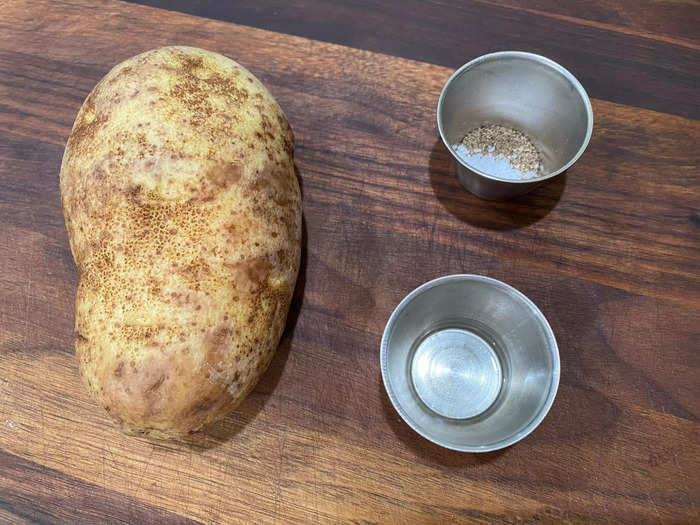 The first potato was cooked in the microwave.