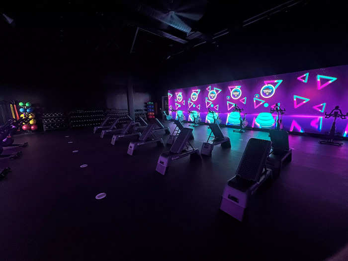 The AI studio features interactive, wall-to-wall LED displays embedded with motion sensors that track gymgoers