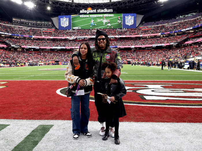 Jay-Z and Blue Ivy both wore statement jackets to the big game.