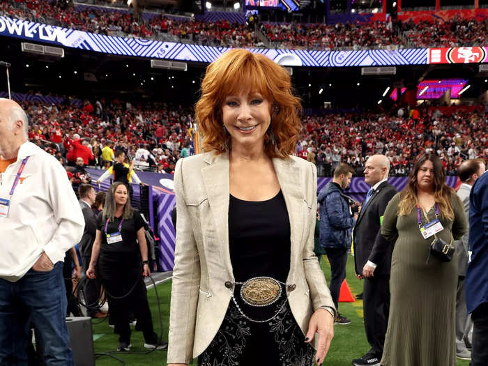 Reba McEntire donned shiny pants to sing the National Anthem.