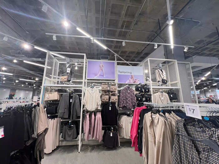 The middle of the store was dedicated to clothes. This section, labeled "Tailoring," was selling $7 blouses. Some items seemed thin, like they might rip, but that