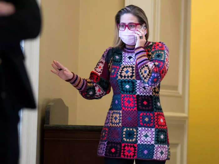 The Arizona senator wore a patchwork-quilt dress to a Democratic luncheon in December 2021.