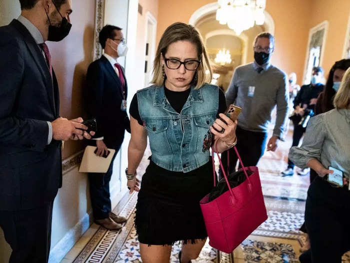 In October 2021, she presided over the Senate in another unusual look for Congress: a denim vest.