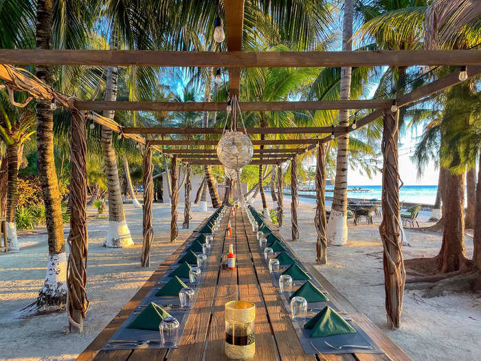 Guests sit at a communal table for breakfast, lunch, and dinner. 