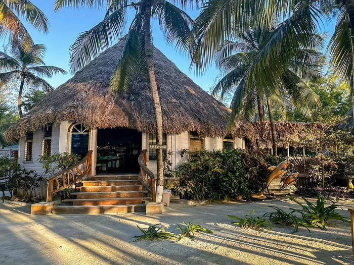 In the main lounge of the island, guests have access to a bar, WiFi, and a small shop stocked with sunscreen, snacks, and shirts. 