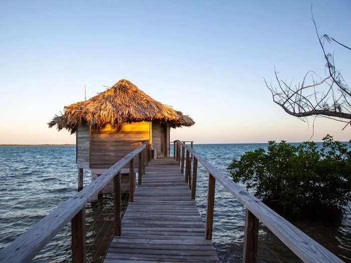 After a two-minute walk, we arrived at a long, narrow walkway leading out to the ocean and our bungalow.