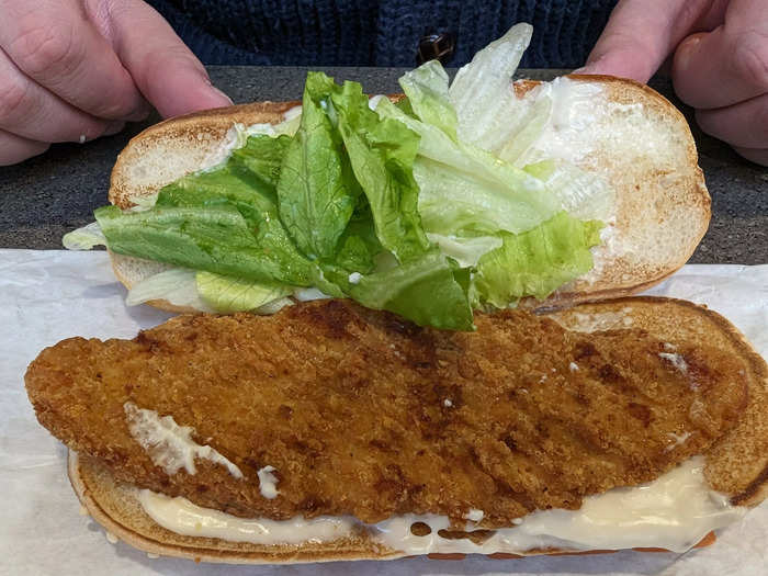 The UK version of the sandwich was served on a seeded bun with chicken, lettuce, and a generous amount of mayo.