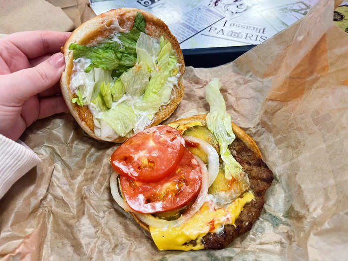 In the US, the Whopper came with one flame-grilled beef patty, cheese, lettuce, tomato, sliced onions, pickles, and mayonnaise on a sesame-seed bun. 