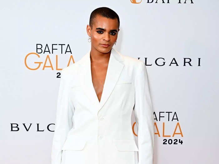 Actor Layton Williams arrived in a white suit.