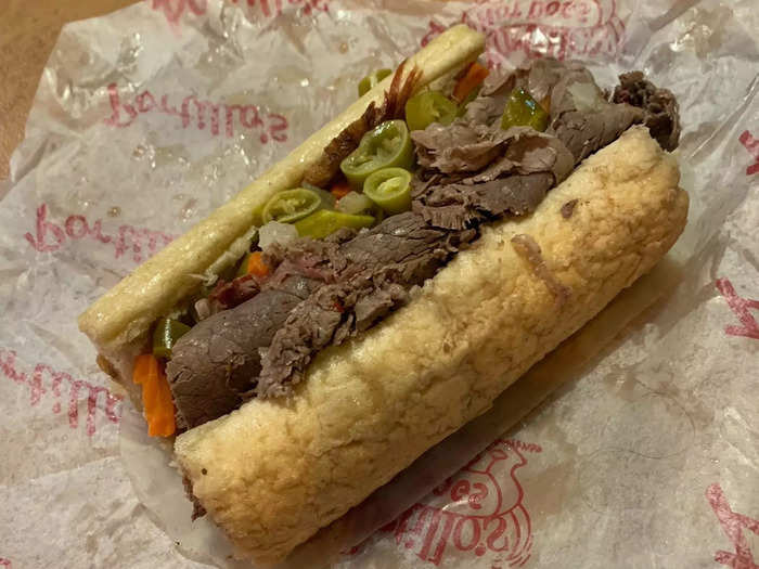 The Italian-beef sandwich comes “wet,” with spiced gravy and giardiniera.