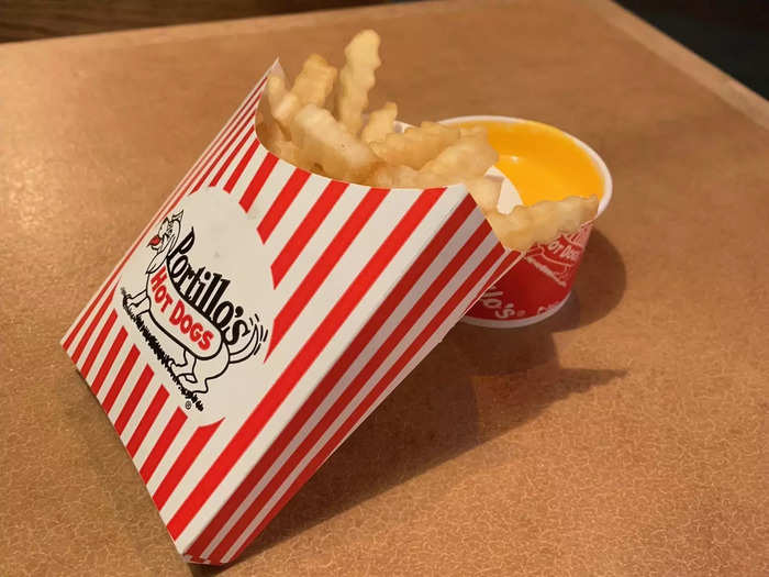 Portillo’s cheese fries are an indulgent side order.