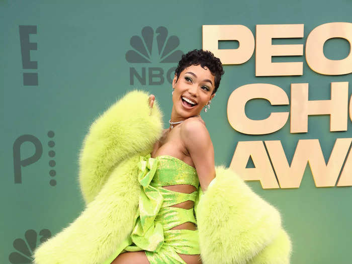 Coi Leray wore a lime green mini-dress with a matching coat.