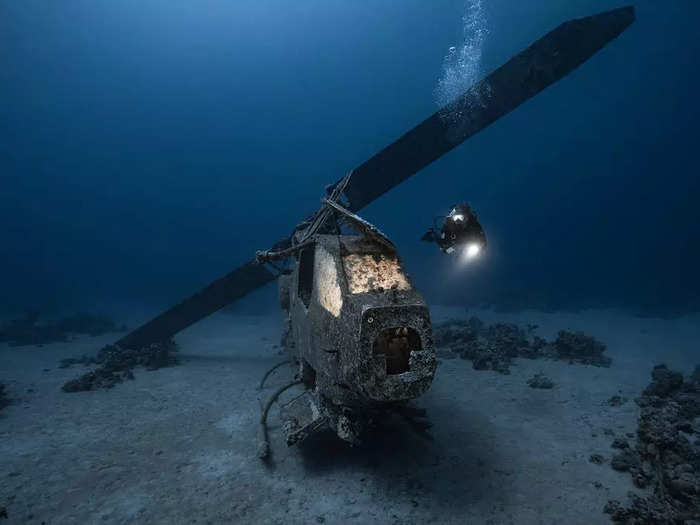 The photographer said he had just 20 minutes to get this stunning shot of a sunken helicopter.