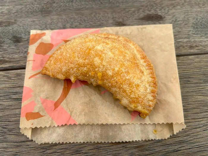 The Cheesy Chicken Crispanada looks similar to an empanada, but it has an unexpected twist.