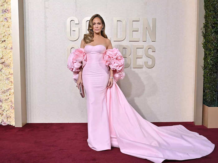 Jennifer Lopez, for example, wore a custom version of a preexisting Nicole + Felicia design at the 2024 Golden Globes.