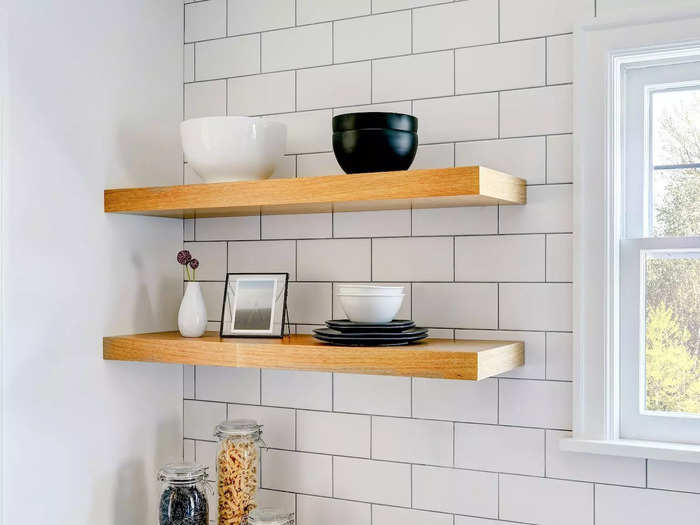 Open shelving in the kitchen can be a chore to keep clean.