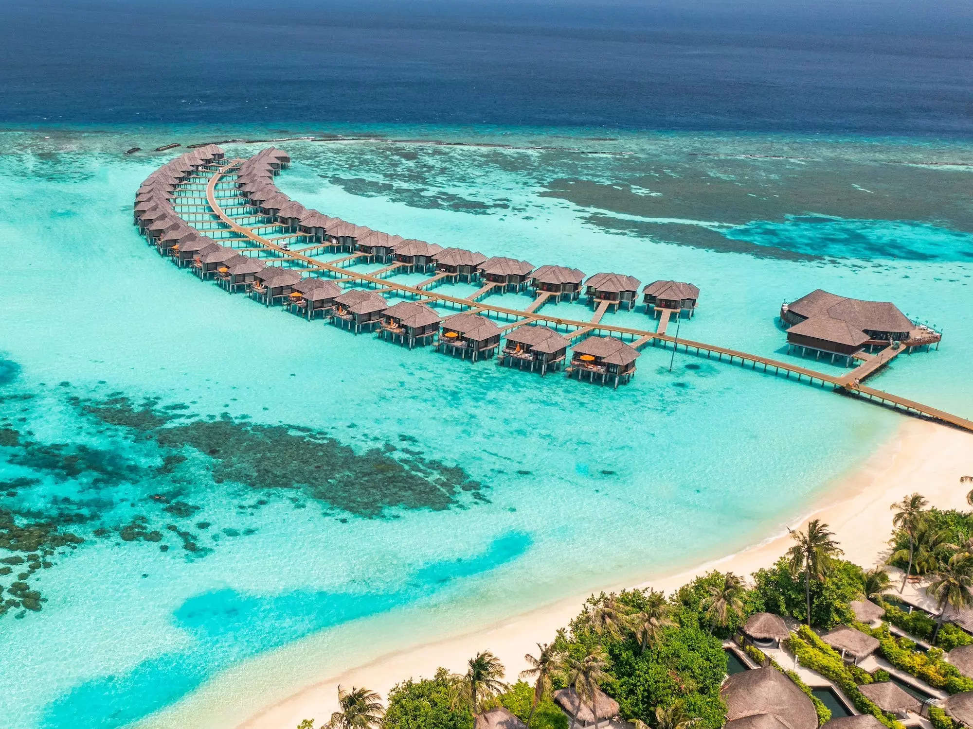 A birds-eye view of bungalows in The Maldives.
