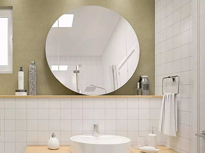 Frameless vanity mirrors can feel dated.