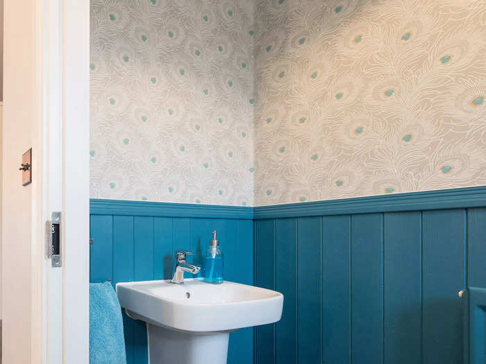 Unprotected wallpaper can get wet and moldy in a bathroom.