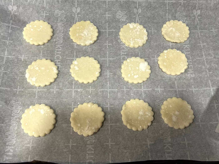 I placed the croutons on my sheet pan and brushed each top with the egg wash. 