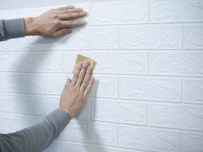 Contact-paper countertops reveal imperfections.