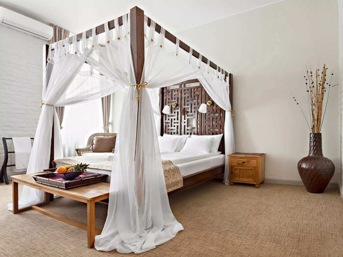 Consider a canopy or bed drapes for an elegant touch.
