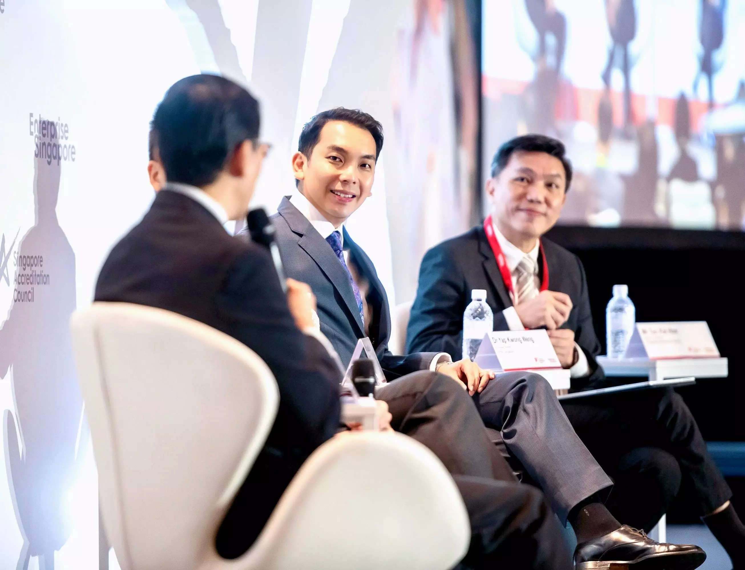 Yap (center) participating in a panel discussion organized by Enterprise Singapore, a government agency that supports enterprise development.
