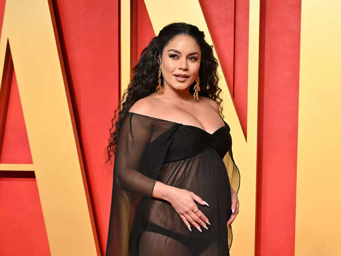 Vanessa Hudgens showed off her baby bump in this strapless gown.