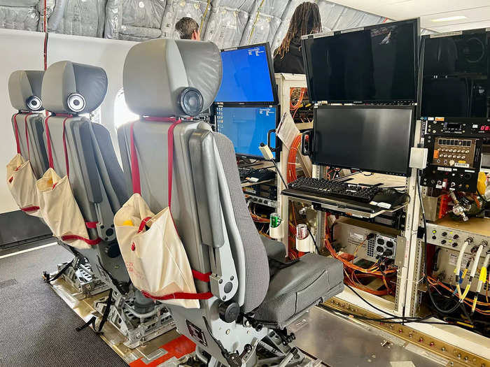 Boeing engineers sit in an area called “The Pit” in the middle of the plane, which monitors different parts of the aircraft, like weight, instrumentation, and engines.