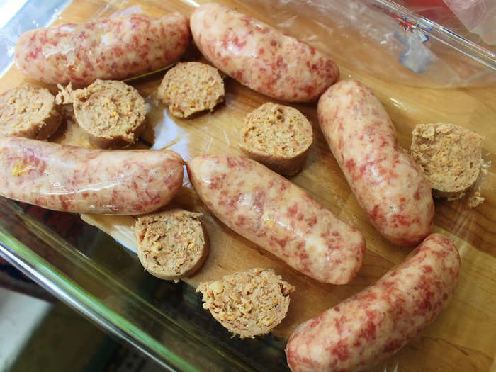 I placed my bangers and sliced white pudding in a glass casserole dish with a drizzle of olive oil.