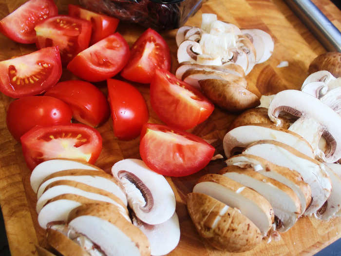 Back in my kitchen, I started by chopping mushrooms and tomatoes.