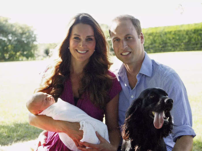 2013: The growing royal family posed for a portrait with their spaniel, Lupo, just after the prince