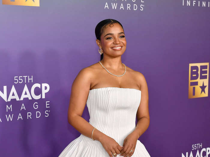 Kyla Pratt went for an unusual silhouette. Her strapless ivory dress featured a voluminous skirt that panned out and cinched back in.