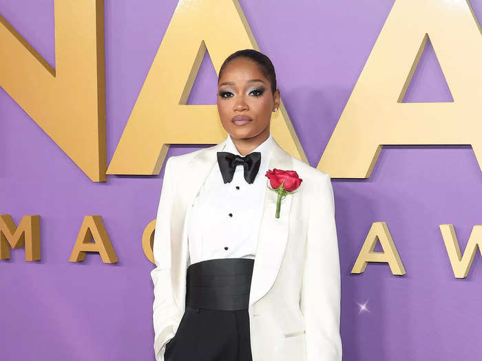Keke Palmer delivered the drama with a dramatic tuxedo with a bow tie and red rose boutonniere.