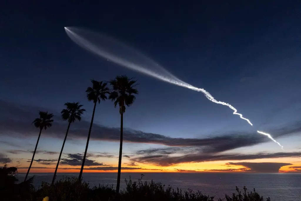 A white blob streaks the sky as SpaceX