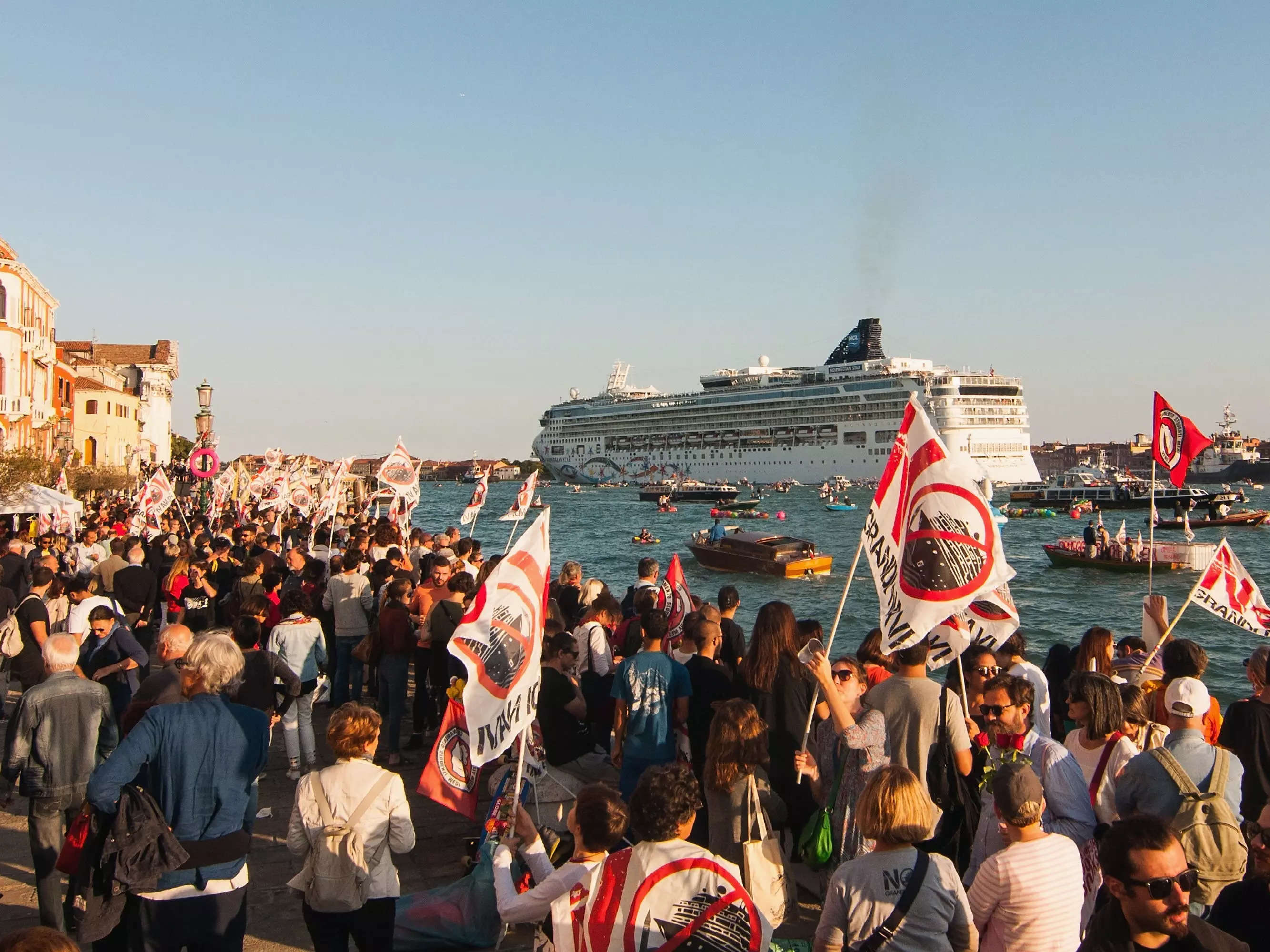 Protesters on small boats demonstrate in the Giudecca canal ahead of the passage of a cruise ship on September 30, 2018 in Venice, Italy.